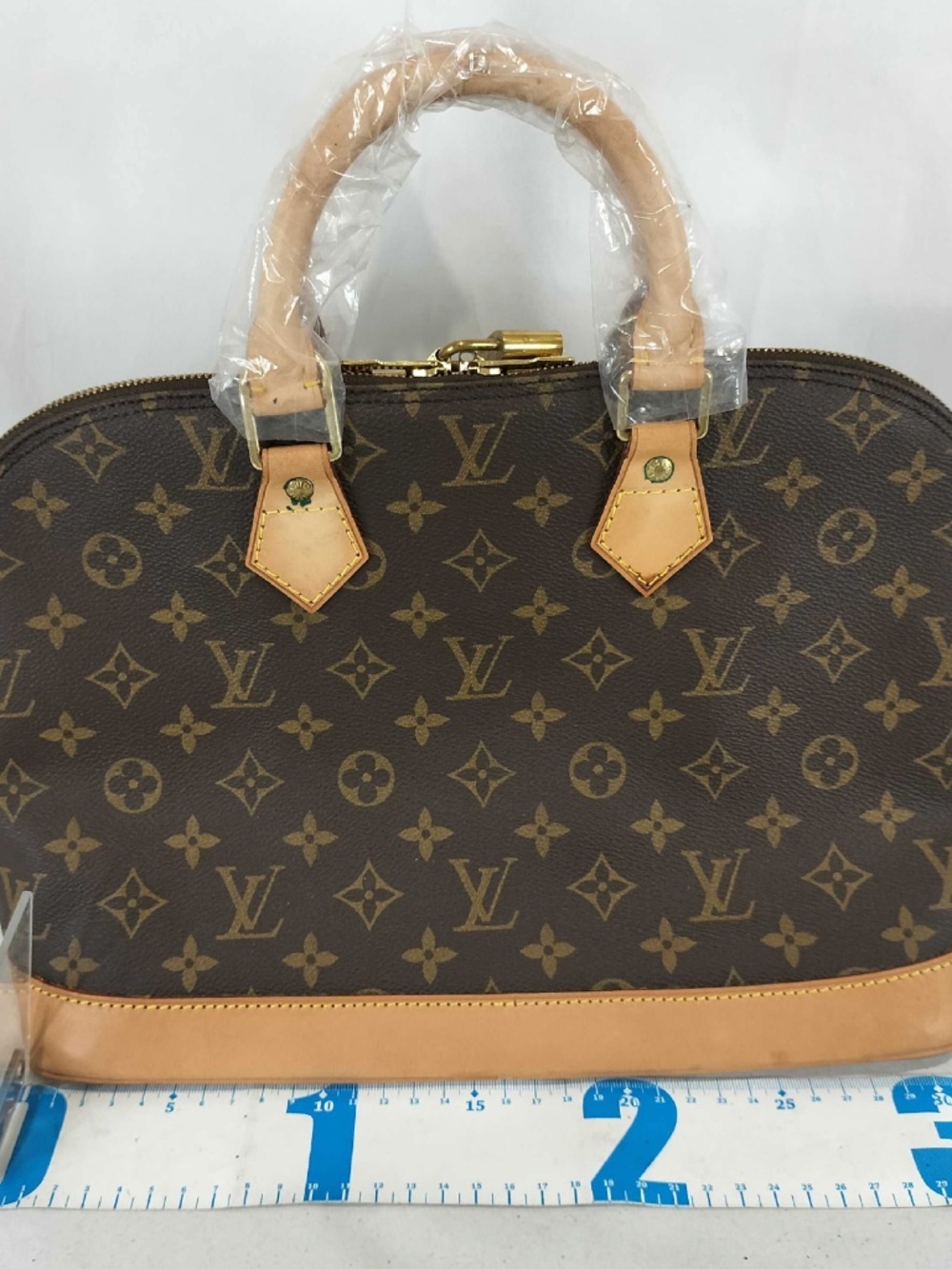 Louis Vuitton Alma PM Monogram Canvas Handbag